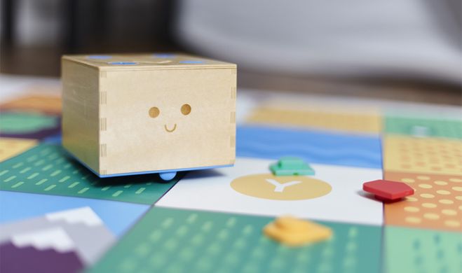 picture of cubetto with instruction blocks on mat