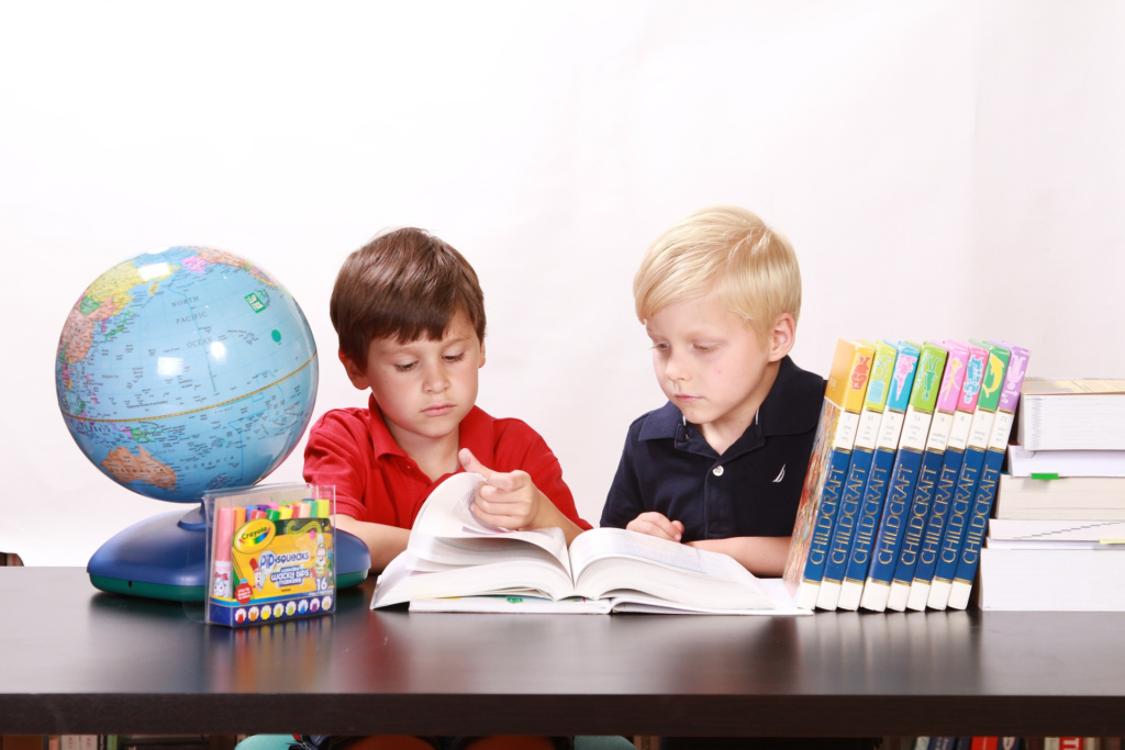 children studying by pixabay user white77