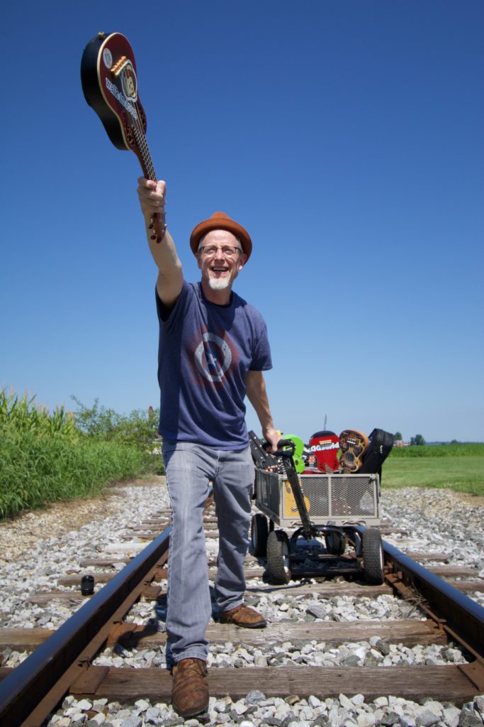 image of Phredd with his instruments on a train track